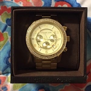 Gold women’s Michael Kors Watch